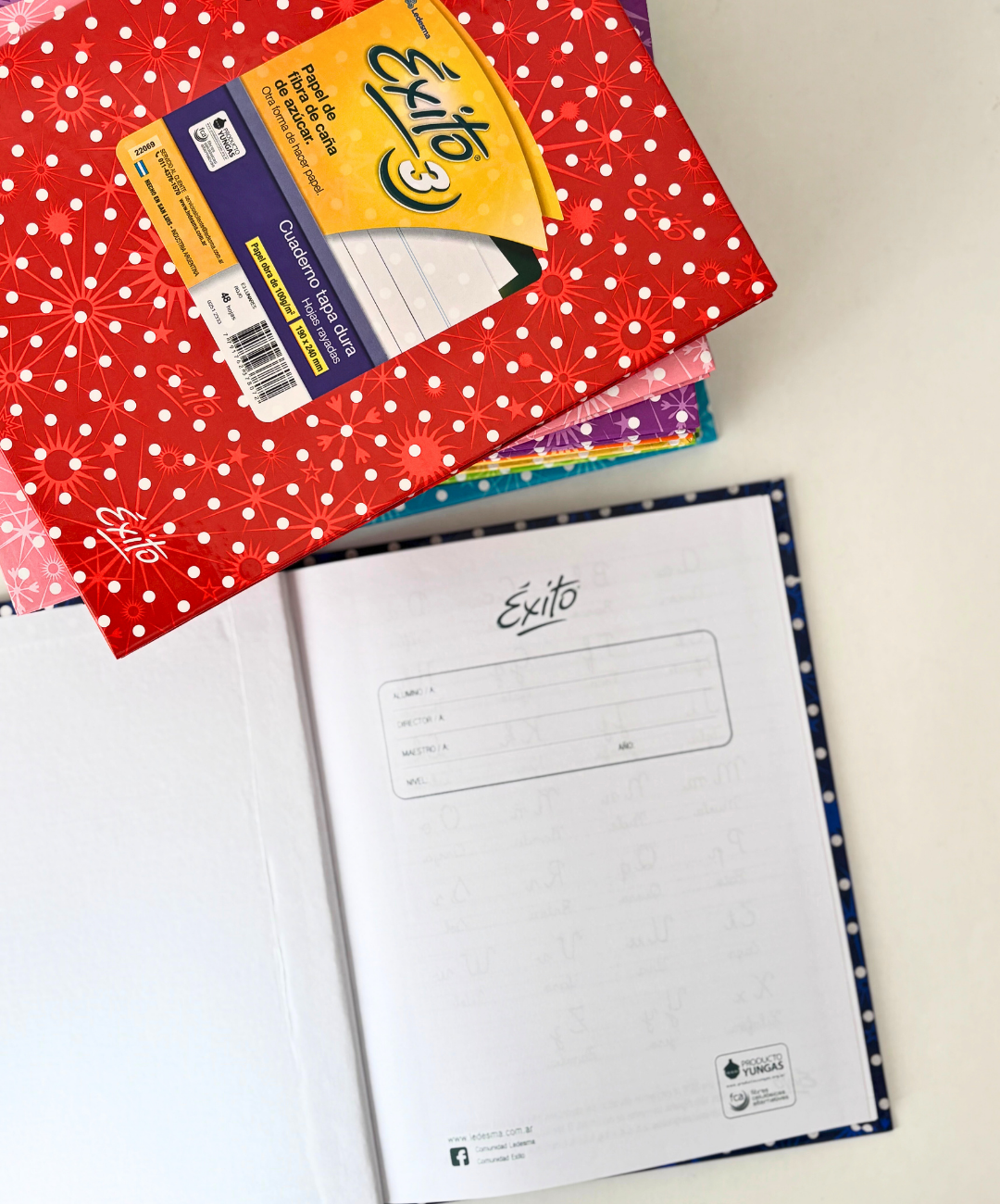 Cuaderno Exito lunares tapa dura 48 hojas rayadas naranja